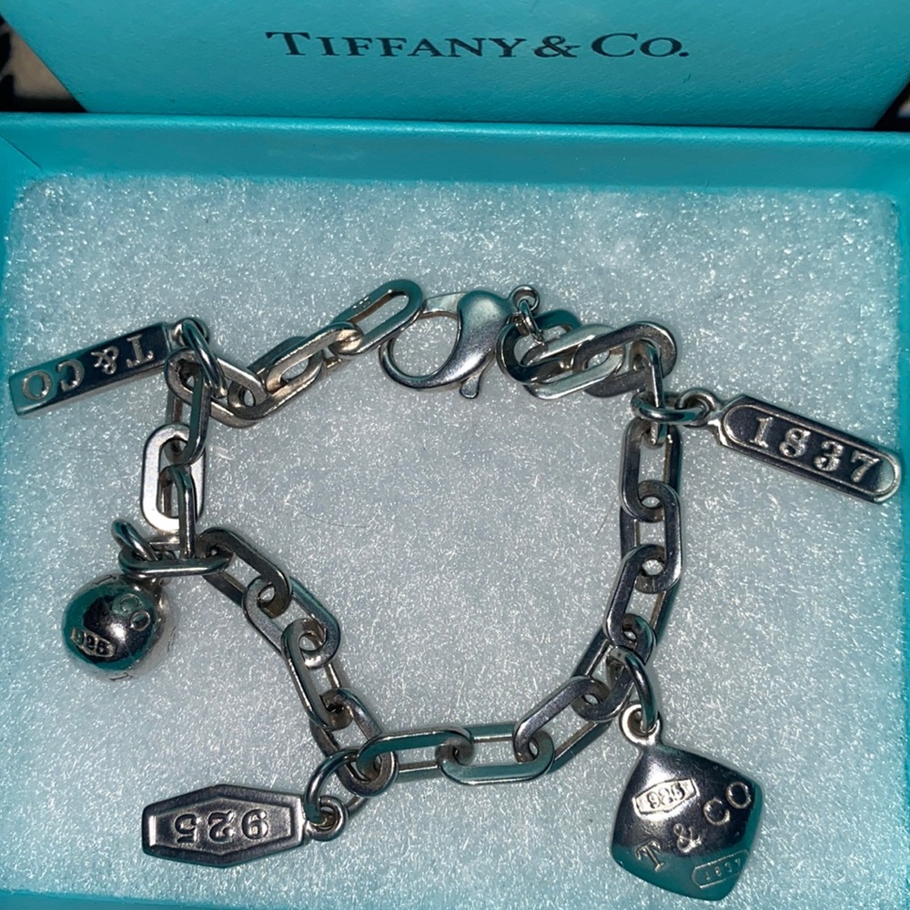 Auth 925Tiffany piece retired bracelet from 1837 silver collection 5th Ave charm